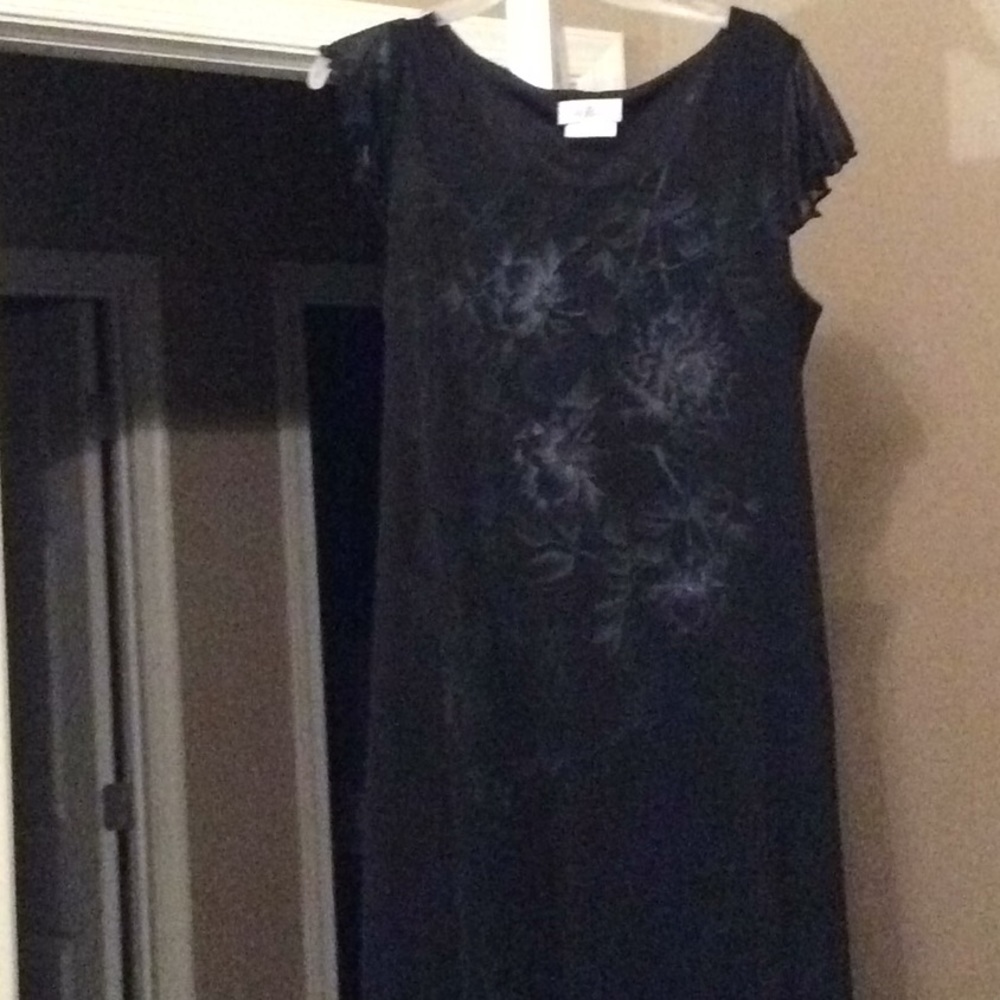 Simple black dress with a touch of blue flowers.